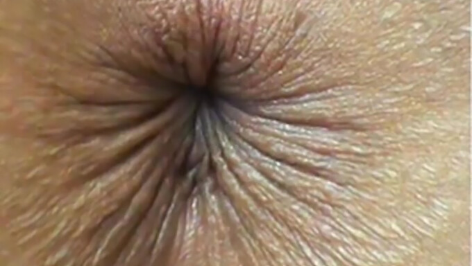 Intimate Close-Up Of An Anus With Webcam And Winking