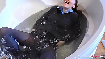 Sophia Smith Uk, A Brunette Beauty, Enjoys A Bath In Her New College Uniform.